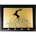 Ver imagem 1 de Porta Chaves Game Of Thrones 3 Em Mdf Tamanho 22 X 15,2 Cm Dourado