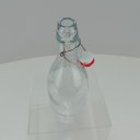 Ver mais imagens de Garrafa de Vidro 350ml Transparente 23x8x8cm Água Suco Geladeira Bebidas Tampa