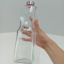 Ver mais imagens de Garrafa de Vidro 1,1L Transparente 27x8x8cm Água Suco Geladeira Bebidas Tampa
