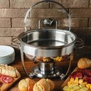 Ver imagem 4 de Rechaud Tramontina Redondo 4,3l Inox com Tampa de Vidro e Fogareiro Banho Maria