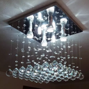 Ver imagem 3 de Lustre de Cristal Para Escritório Com 25cm Altura e Base de Inox Espelhada 30x30cm