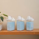 Ver imagem 5 de Kit de 3 Porta Sabão em Pó 1,8l com Copo Dosador e Travas de Lavanderia - Oikos