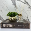 Ver imagem 2 de Kit decorativo livro + vaso dourado + difusor de vidro