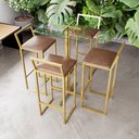 Ver imagem 1 de Jogo Mesa Alta Bistrô Quadrada Vidro 4 Banquetas Estofado Confort Industrial Dourado Don Castro Deco