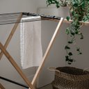 Ver mais imagens de Varal Horizontal Chão Dobrável em Bambu com Hastes Metálicas - Simplo