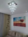 Ver imagem 1 de Lustre de Cristal para Sala , Quarto com 40 Cm de Altura , Base de Inox Espelhado 30x30 Cm