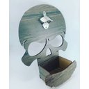 Ver imagem 1 de ABRIDOR DE GARRAFA COM DISPENSER PARA AS TAMPINHAS CAVEIRA