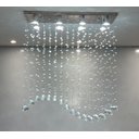 Ver imagem 4 de Lustre para Mesa de Jantar de Cristal Tipo Onda Base de Inox 70x20cm com 70cm de Altura