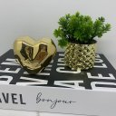 Ver imagem 2 de Livro decorativo, vaso cerâmico dourado e coração trabalhado
