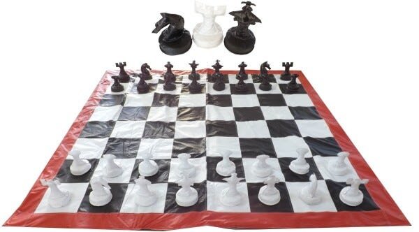 Xadrez jogo de tabuleiro de xadrez gigante ambientado no jardim