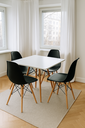 Ver imagem 1 de Jogo Mesa Sala Cozinha Jantar Quadrada Eiffel Mdf Branco 90cm e 4 Cadeiras Charles Eames Pretas