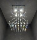 Ver imagem 3 de Lustre de Cristal para Sala de Jantar / Estar com 30cm de Altura Base de Inox Espelhado de 30x30 Cm