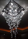 Ver imagem 1 de Lustre de Cristal para Sala de Jantar/estar,base de Inox Polido 42x42cm , com 70cm de Altura