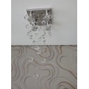 Ver imagem 3 de Lustre de Cristal para Sala com 70cm de altura e base de inox espelhado de 20x20cm