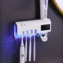 Ver imagem 5 de Suporte Dipenser com Esterilizador Uv Porta Escova e Pasta D