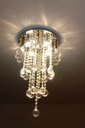 Ver imagem 1 de LUSTRE DE CRISTAL PARA SALA COM 50CM DE ALTURA, BASE DE INOX DE 30CM DE DIÂMETROS