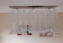 Ver imagem 3 de Lustre de Cristal para Sala de Jantar, Base de Inox 70x20cm e 06 Gu10 Lâmpadas de