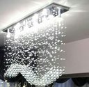 Ver imagem 1 de Lustre para Sala de Jantar Retangular de 70x20cm com Cristais Legítimos e Base de Inóx