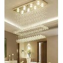 Ver imagem 2 de LUSTRE DE CRISTAL , PARA SALA DE ESTAR/JANTAR COM 90CM DE ALTURA BASE DE INOX ESPELHADO DE 70X20CM