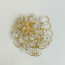 Ver imagem 1 de Kit 50 Anéis para Guardanapo Cristalino Dourado 4x3cm – Mesa Posta Sofisticada