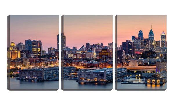 Quadro Decorativo 55x110 prédios iluminados ao pôr do sol - 1