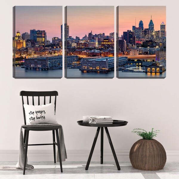 Quadro Decorativo 55x110 prédios iluminados ao pôr do sol - 2