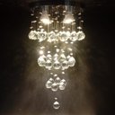 Ver imagem 1 de Lustre de Cristal para Sala 80cm de Altura Base de Inox Polido 30 Cm de Diâmetro