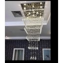 Ver imagem 1 de Lustre de Cristal com 1,80 Metros de Altura,Para Pé Direito Duplo,Base de Inox Espelhado de 70X70 Cm