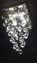 Ver imagem 3 de LUSTRE DE CRISTAL PARA, SALAS DE ESTAR E JANTAR COM 50CM DE ALTURA,BASE DE INOX ESPELHADO 30X30CM