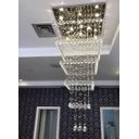 Ver imagem 1 de LUSTRE DE CRISTAL COM 1,5 M DE ALTURA,BASE INOX 70X70CM ,PARA PÉ DIREITO DUPLO,VÃO DE ESCADA