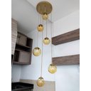 Ver imagem 2 de Pendente Moderno Dourado Pé Direito Alto Sala Vão de Escada Arevo Iluminação Jabuticaba VIDRO ÂMBAR