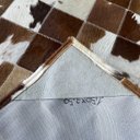 Ver imagem 3 de Tapete Couro Castanho Malhado 1,50x2,50 com Borda Pç 10x10cm