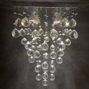 Ver imagem 2 de LUSTRE DE CRISTAL PARA SALA,QUARTO,RECEPÇÃO COM 60CM DE ALTURA,BASE DE INOX POLIDO DE 30X30CM