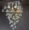 Ver imagem 3 de LUSTRE DE CRISTAL PARA SALA,QUARTO,RECEPÇÃO COM 60CM DE ALTURA,BASE DE INOX POLIDO DE 30X30CM