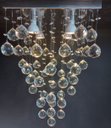Ver imagem 1 de LUSTRE DE CRISTAL PARA SALA,QUARTO,RECEPÇÃO COM 60CM DE ALTURA,BASE DE INOX POLIDO DE 30X30CM