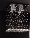 Ver imagem 1 de Lustre Chuva Reta de Cristais para Sala/Quarto com 40cm de Altura e Base de Inox Espelhado de 30x30Cm