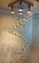 Ver imagem 4 de Lustre de Cristal para Sala, Espiral com 70cm de Altura, Base de Inox de 20x20cm