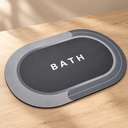 Ver imagem 3 de Tapete de Banheiro Oval Cinza Absorvente Antiderrapante 68 x 44 cm Estampa Bath