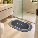 Ver imagem 4 de Tapete de Banheiro Oval Cinza Absorvente Antiderrapante 68 x 44 cm Estampa Bath