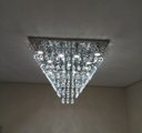 Ver imagem 2 de Lustre De Cristal Para Sala/Hall Com 60cm De Altura, Base De Inox Espelhado com 70X70cm