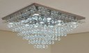 Ver imagem 1 de Lustre De Cristal Para Sala/Hall Com 60cm De Altura, Base De Inox Espelhado com 70X70cm