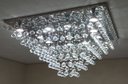 Ver imagem 2 de Lustre de Cristal Para Sala/ Hall com 50cm De Altura, Base De Inox Espelhado Com 70X70cm