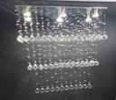 Ver imagem 1 de Lustre de Cristal para sala de estar/jantar com 1 metro de altura, base de inox polido 70X20cm