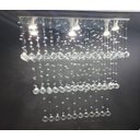 Ver imagem 3 de LUSTRE DE CRISTAL PARA SALA DE ESTAR/JANTAR COM 80CM DE ALTURA, BASE DE INOX ESPELHADO 70X20CM