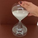Ver imagem 2 de Ampulheta Decorativa de Vidro Transparente 22x12x12cm Enfeite Mesa Estante Sala