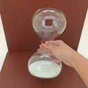 Ver imagem 5 de Ampulheta Decorativa de Vidro Transparente 22x12x12cm Enfeite Mesa Estante Sala