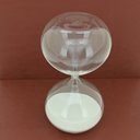 Ver imagem 3 de Ampulheta Decorativa de Vidro Transparente 22x12x12cm Enfeite Mesa Estante Sala