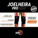 Ver mais imagens de Kit Joelheira Volêi Com Manguito Longo Tm7 Preto/Azul G/GG