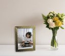 Ver imagem 2 de Porta-Retrato Dourado em Aço Inox 20x15cm - By Fineza