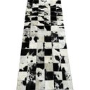 Ver imagem 1 de Tapete de couro preto branco malhado 0,60x1,50 s/b pç 10x10